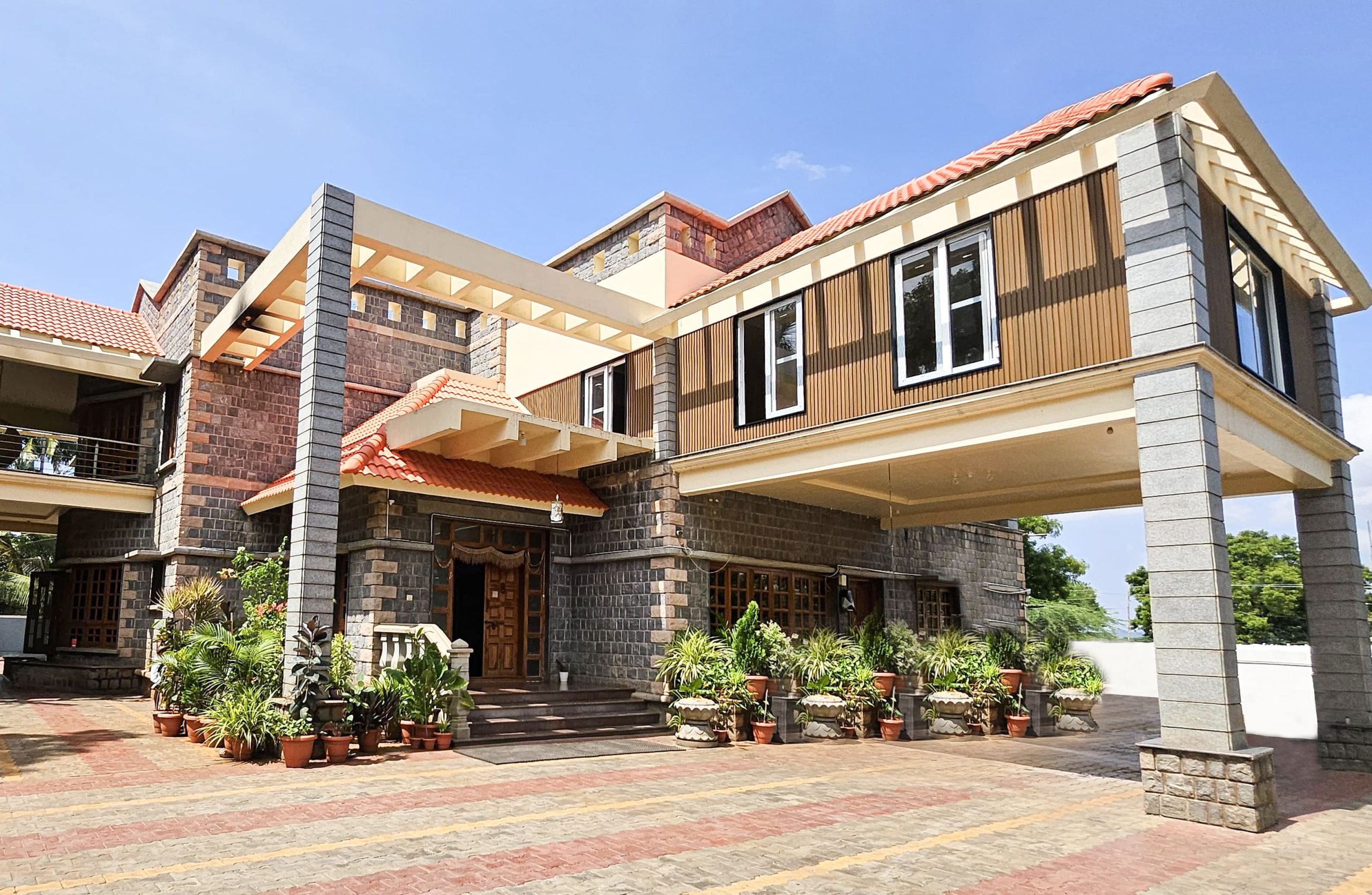 Home exterior with WPC cladding by best WPC supplier India Everwood.